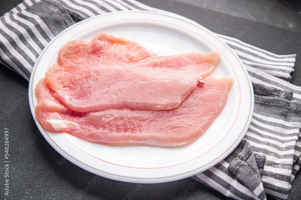 turkey fillet meat poultry fresh delicious snack healthy meal food snack diet on the table copy space food background rustic top view turkey fillet meat poultry fresh delicious snack healthy meal food snack diet on the table copy space food background rustic top view