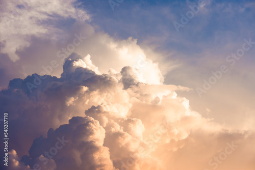 Colorful storm cloudscape formation during a bad weather in the morning or evening. View above the clouds