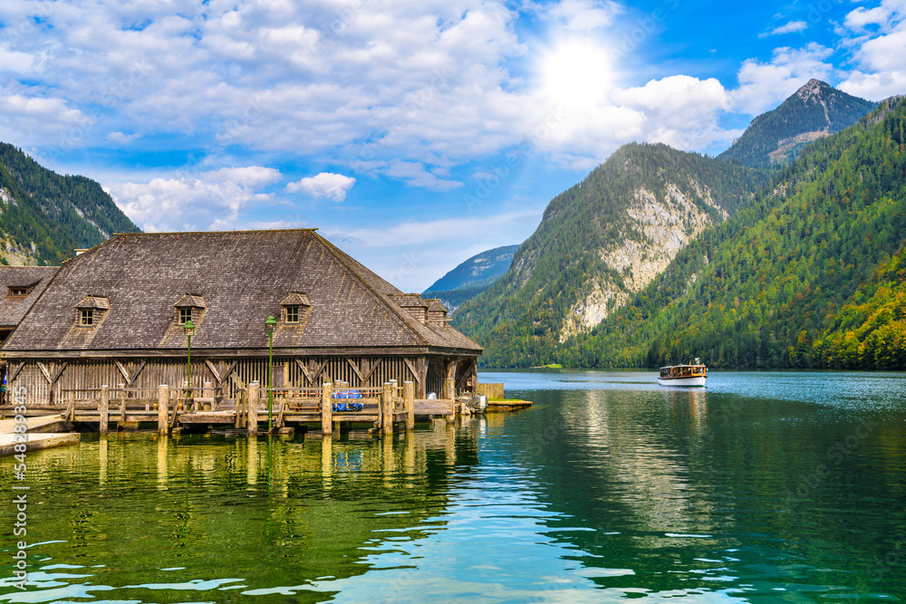Wooden old houses on the lake Koenigssee, Konigsee, Berchtesgaden National Park, Bavaria, Germany