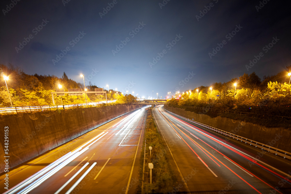 Fototapeta premium Autbahn @ night Frankfurt with lightsteaks