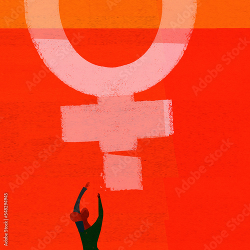 Female gender symbol out of reach of woman photo