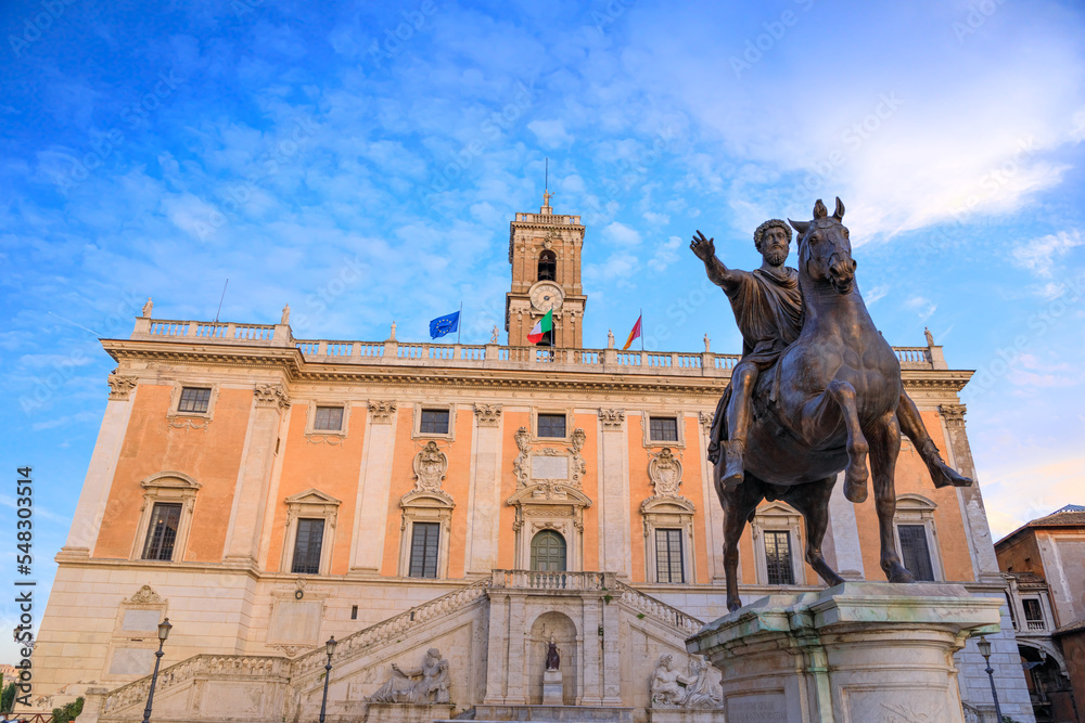 The Capitoline Hill in Rome, Italy: Statue of Roman Emperor Marcus Aurelius on horseback in front of the Palazzo Senatorio.