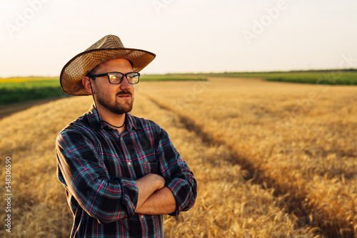 Farmer proudly takes a look at his field