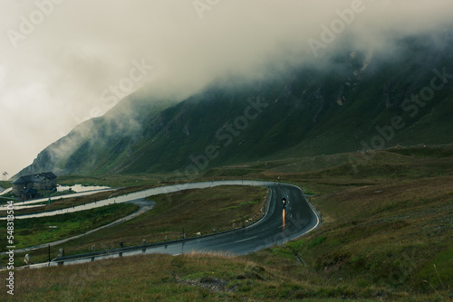Fototapeta alpine mountain road with motocycle