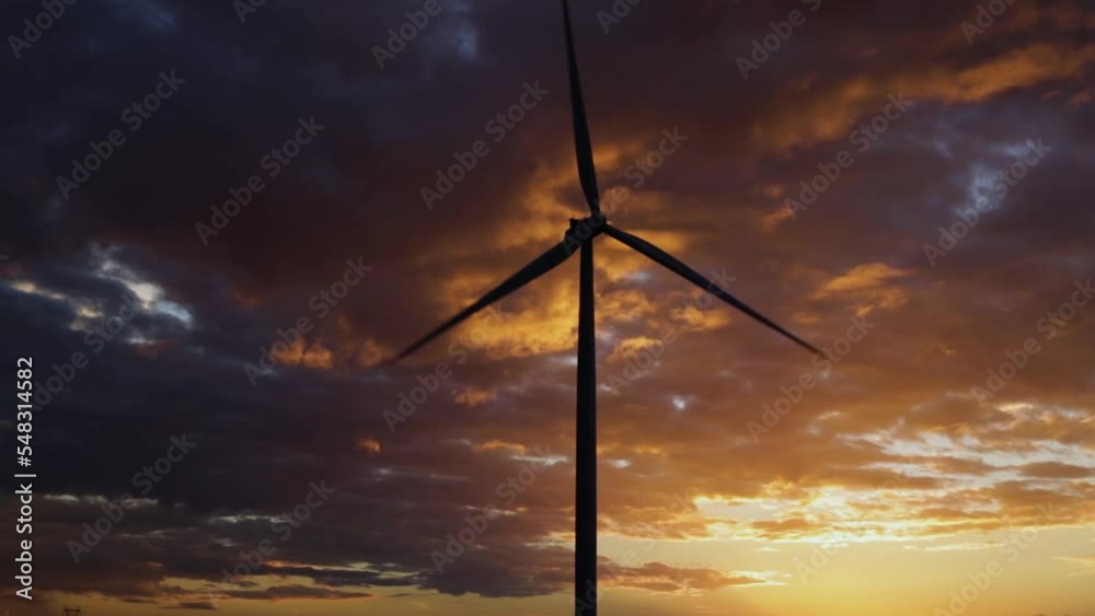 Castilla Leon, Spain. October 11, 2022. time lapse of wind power tower at sunset Castilla Leon, Spain. October 11, 2022. time lapse of wind power tower at sunset