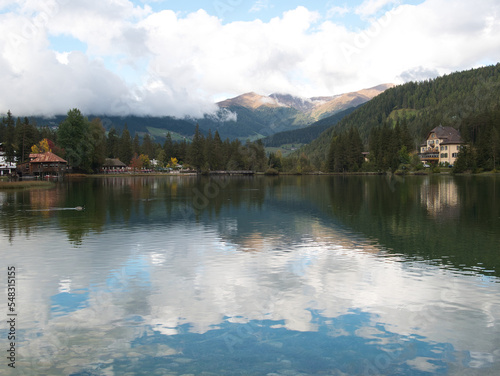 Autumn morning after the rain by the lake of Dobbiaco Toblacher See . South Tyrol  province of Bolzano. Dolomites  Italy.