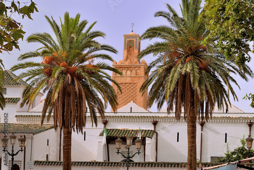 THE CITY OF TLEMCEN IN ALGERIA WITH THE GREAT MOSQUE AND THE RUINS OF MANSOURAH MINARET photo