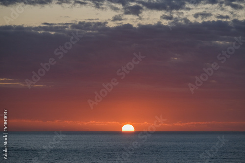 Beautiful horizon sunrise sunset dusk dawn twilight blue hour over ocean sea with sea gulls nature seascape scenery
