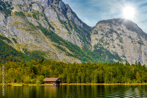 Wooden old fish house on the lake Koenigssee, Konigsee, Berchtesgaden National Park, Bavaria, Germany