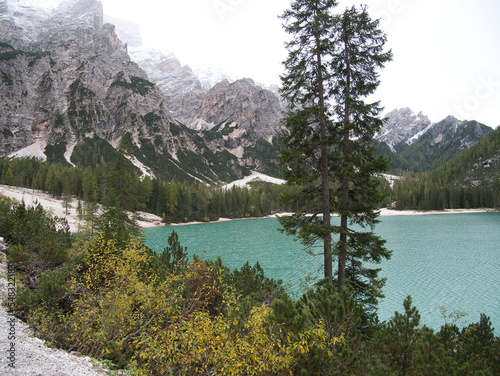 On the trails around Braies Lake in the fall. Dolomites, Italy.