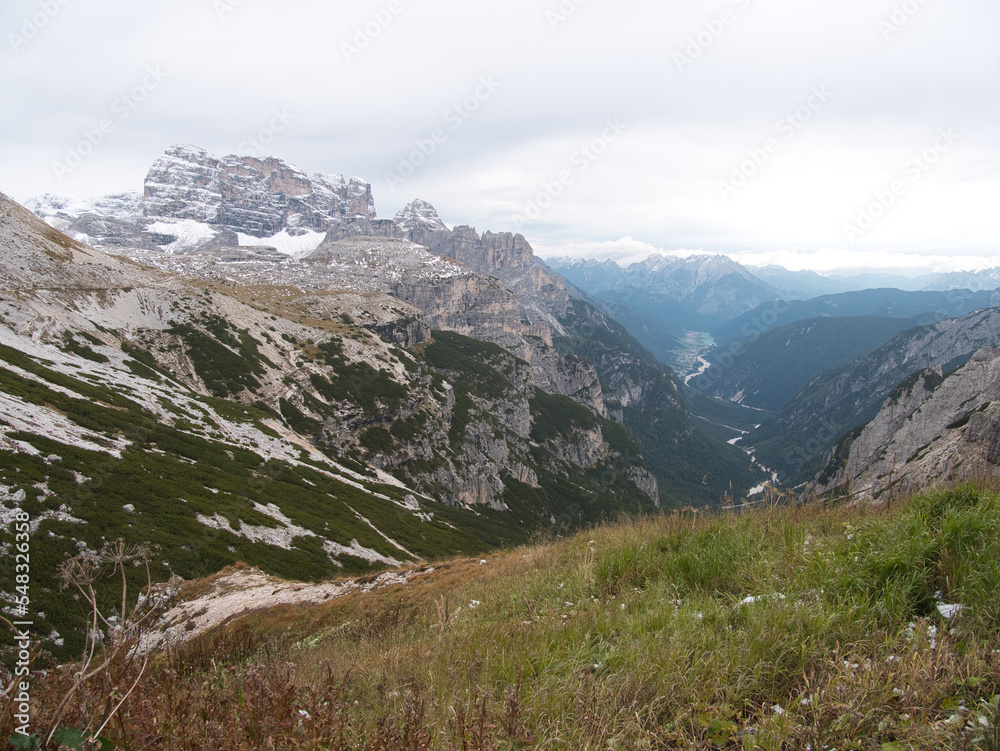 Panoramic views in autumn from above along Tre Cime di Lavaredo. Dolomites, Italy. Panoramic views in autumn from above along Tre Cime di Lavaredo. Dolomites, Italy.