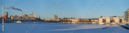 Panorama, snowy winter view at the bay Hammarby Sjö, low solstice, long shadows and clear sky, in Stockholm © Hans Baath