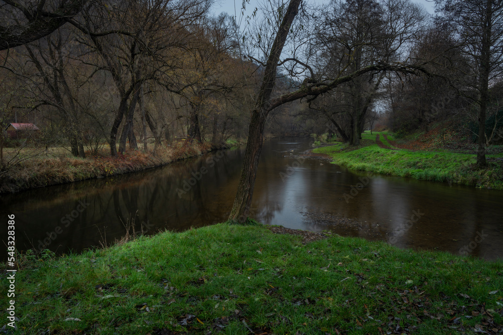 Confluence of Svratka and Loucka river near Tisnov town in dark autumn evening