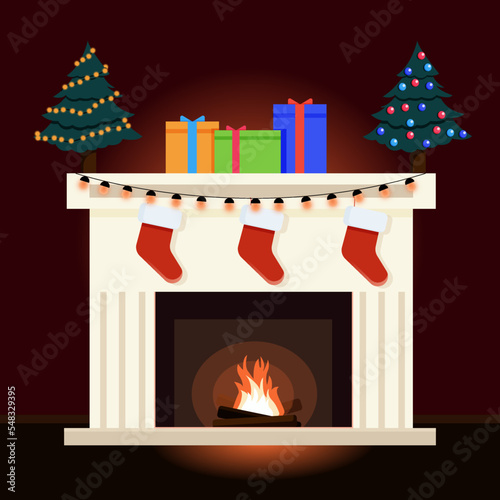 Nise fireplace with gifts and christmas socks. Christmas time photo