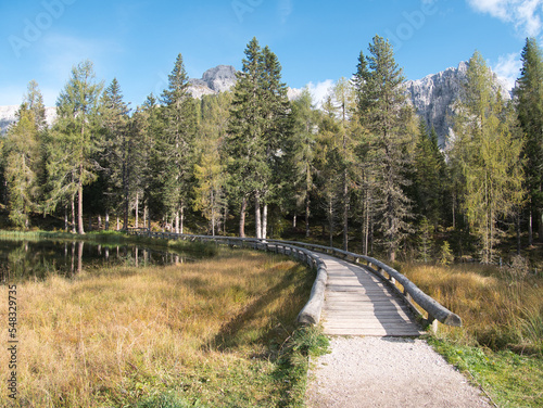 A sunny autumn day along Lake Antorno, Dolomites, Italy.