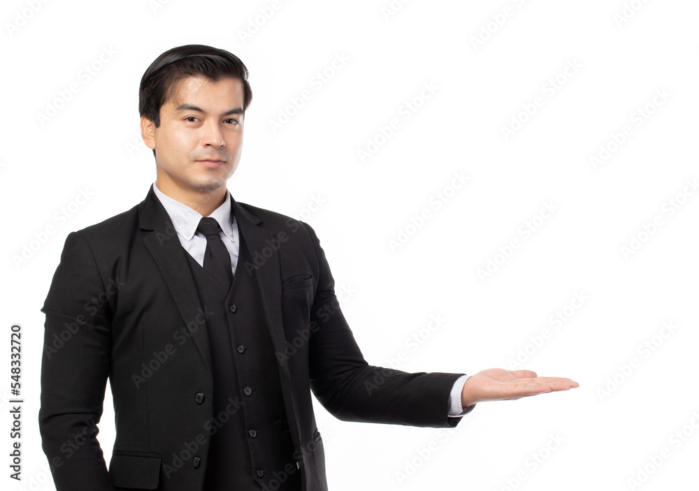 Businessman smiling, holding open palm with empty copy space. Business man showing hand sign to side concept of advertisement product isolated on white background. Businessman smiling, holding open palm with empty copy space. Business man showing hand sign to side concept of advertisement product isolated on white background.