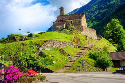 Giornico village in an alpine valley, swiss Alps mountains, Switzerland photo