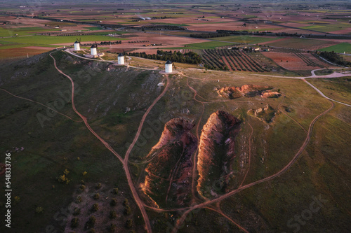 Windmills. These iconic towers over their skylines of la Mancha. 