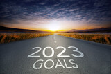 Asphalt road and inscription Goals 2023