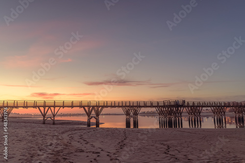 bridge over the bay at sunset © TREAURESTOCK
