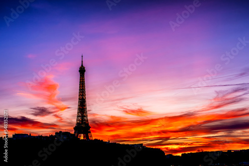 Silhouette of the Eiffel Tower in Paris France, at sunset © Allen.G