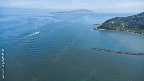 Drone photos (overhead view) of Cerro el Morro, Lido beach, Los Canales beach and the city of Lechería. In the photos you can see boats navigating the coasts of Cerro El Morro from an overhead shot, a