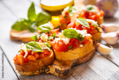Italian bruschetta bread with tomato, basil and mozzarella cheese
