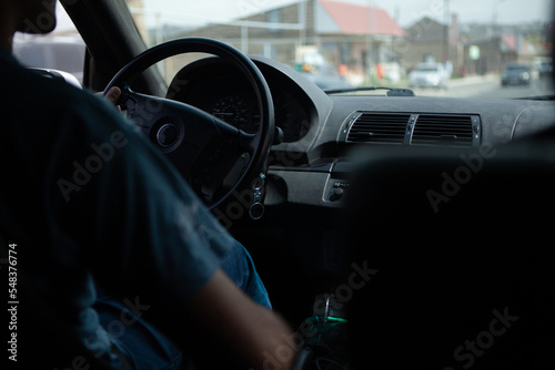 young man drives a car. © S...