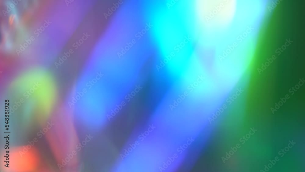 Lens flare. The light through the crystal facets flashes with multicolored rainbow colors. A magical background for Christmas Lens flare. The light through the crystal facets flashes with multicolored rainbow colors. A magical background for Christmas