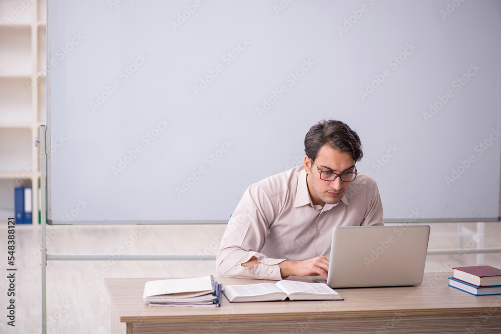 Young male student in telelearning concept Young male student in telelearning concept