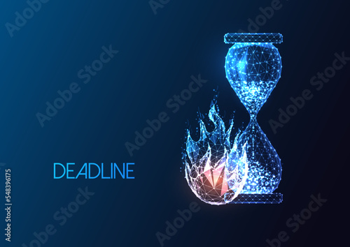 Futuristic deadline concept with glowing low polygonal hourglass and fire flame isolated on blue