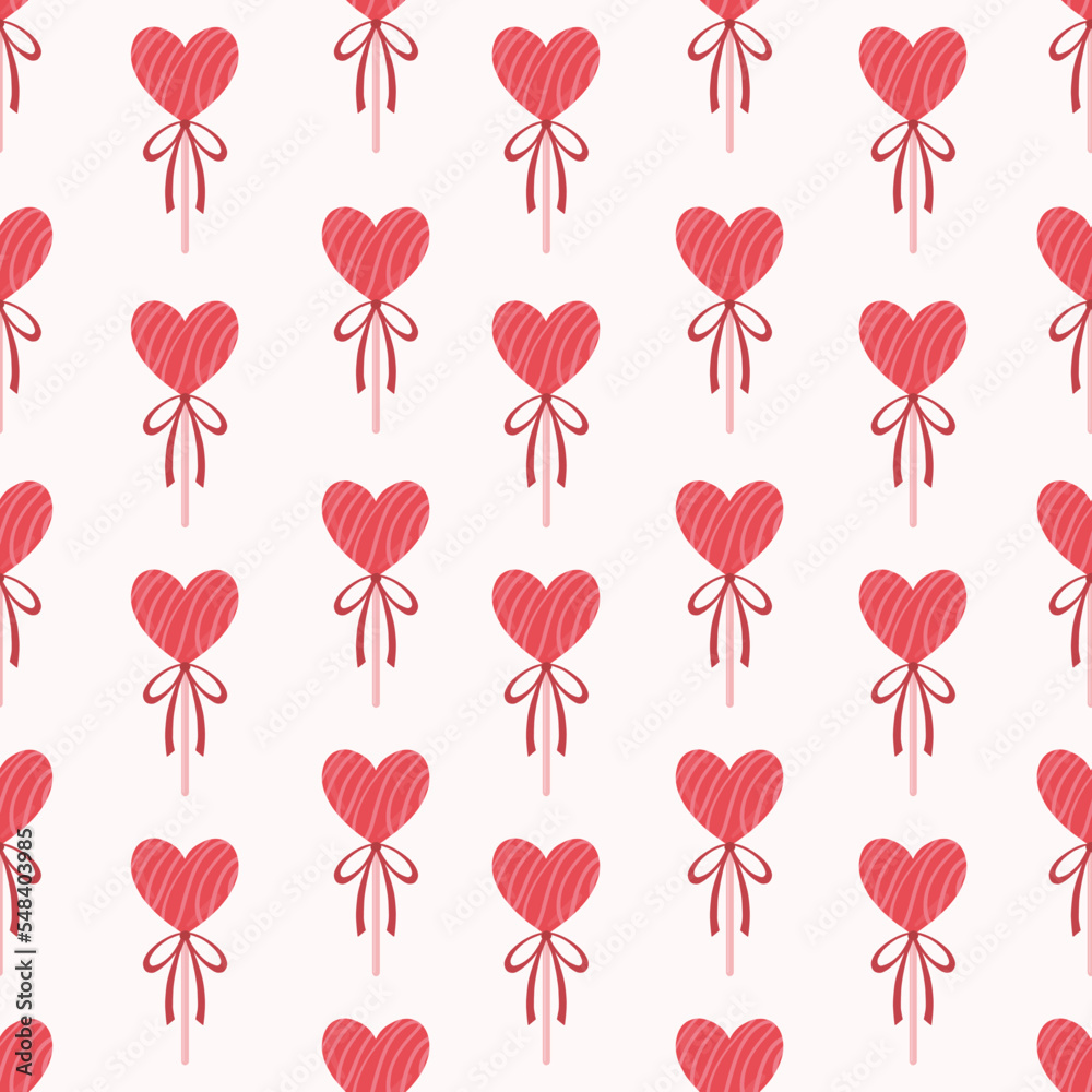 A pattern of candy hearts on a stick. Candy heart pattern. Pattern for Valentine's Day.