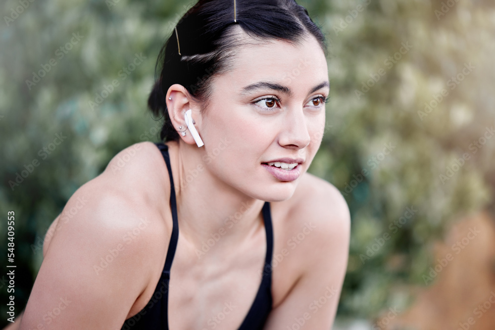 Fitness, podcast and woman in nature tired from running exercise, cardio workout or training for wellness. Runner, breathing or sports girl with fatigue relaxing or resting on break in park in Miami Fitness, podcast and woman in nature tired from running exercise, cardio workout or training for wellness. Runner, breathing or sports girl with fatigue relaxing or resting on break in park in Miami