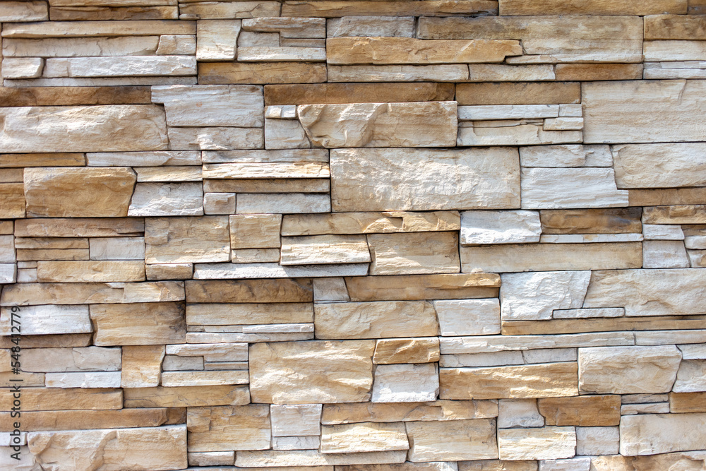 Decorative decoration with bricks on the wall of the house. Decorative decoration with bricks on the wall of the house.
