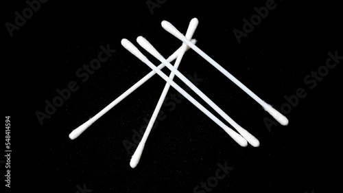 Isolated a couple pieces of cotton bud with black background.
