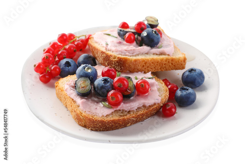 Tasty sandwiches with cream cheese, blueberries and red currants isolated on white