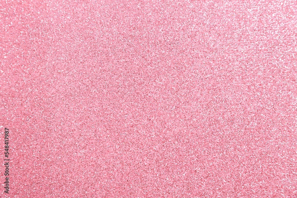 Fototapeta premium Beautiful pink shiny glitter as background, top view