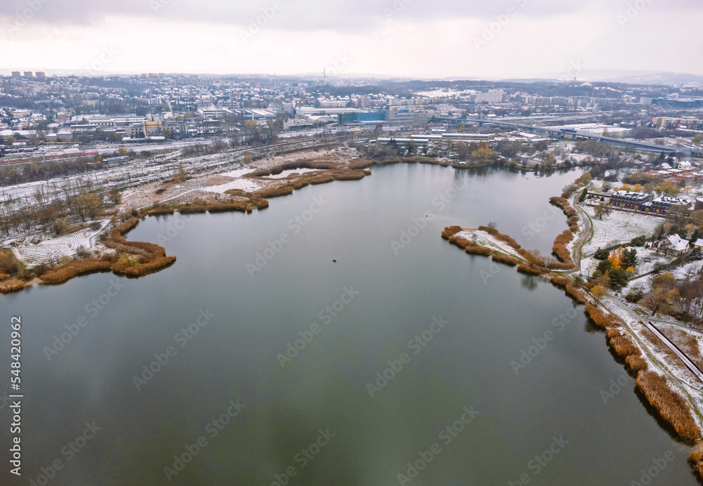 Aerial view, drone photo of lagoon, lake , frost and winter. Urban landscape.