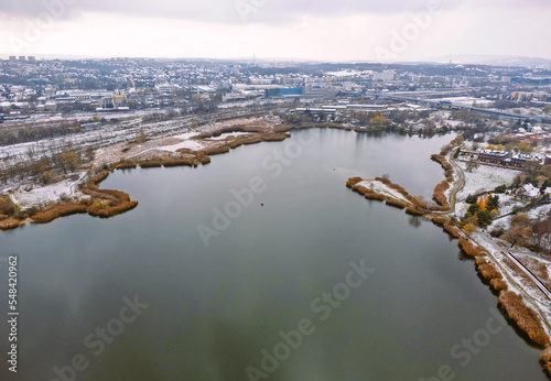 Obraz na płótnie Aerial view, drone photo of lagoon, lake , frost and winter. Urban landscape. w salonie