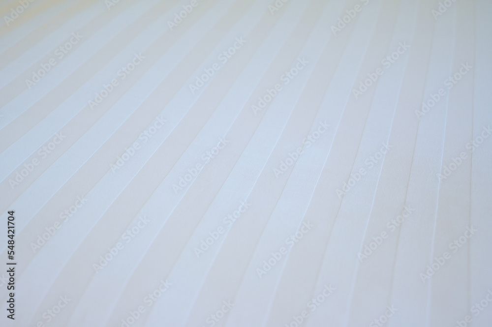 Obraz premium white blanket on bed, textured of fabric