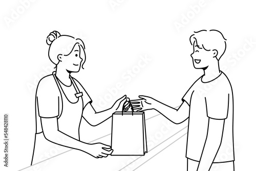 Smiling female cashier give cardboard bag to happy male customer in shop. Happy woman seller hand package to excited man client in store. Vector illustration. 