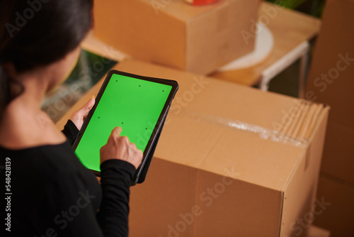 Woman Ordering Moving Service photo