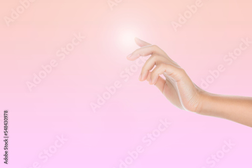 Beauty and Health theme: beautiful elegant female hand show gesture on an isolated Pink background.