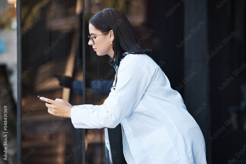 Woman, doctor and phone on hospital break, clinic balcony or consulting on social media, internet research or schedule planning. Thinking healthcare worker, mobile technology and 5g calendar app