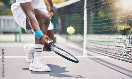 Tennis, fitness and black man hands in an outdoor sports court game doing training and workout. Wellness exercise and cardio energy of an athlete on a tennis court in a professional competition © L Ismail/peopleimages.com
