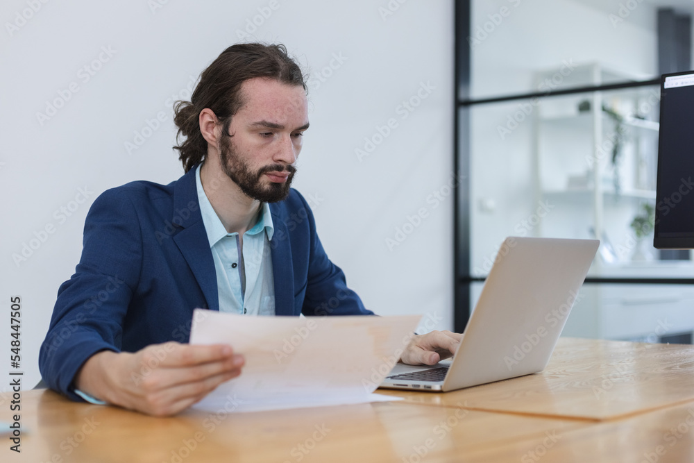 Handsome businessman with mustache beard on face online meeting using laptop at meeting room. attractive businessperson sitting working in workplace. Handsome businessman with mustache beard on face online meeting using laptop at meeting room. attractive businessperson sitting working in workplace.