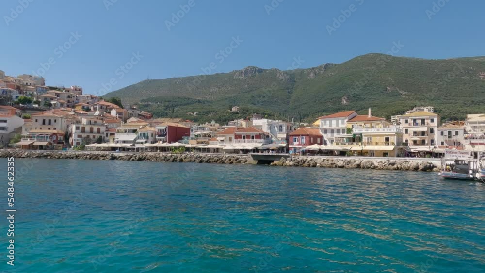 Panning shot revealing the stunning waterfront apartments looking out onto the tropical sea at Parga Panning shot revealing the stunning waterfront apartments looking out onto the tropical sea at Parga