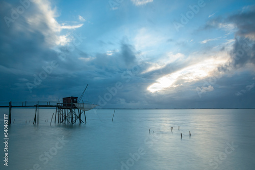 Blue hour with fishing hut on stilts on west Atlantic coast of Charente Maritime, France