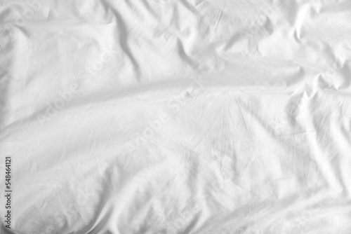 White crumpled bed sheet, closeup