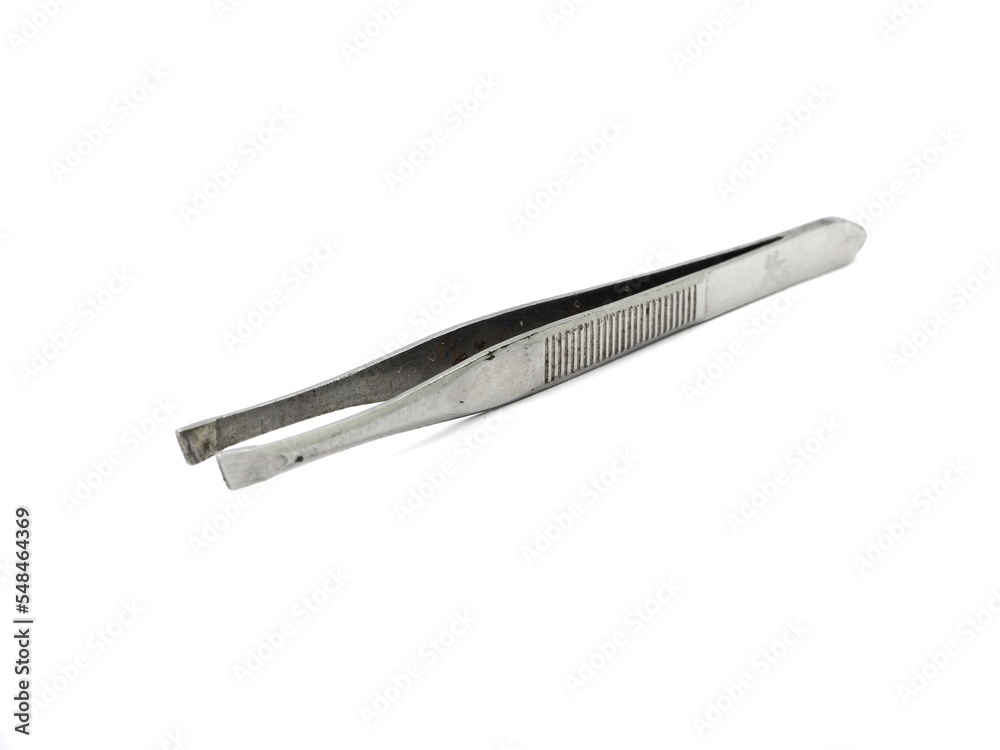Nail cutting device for beauty salon on a white background. Nail cutting device for beauty salon on a white background.